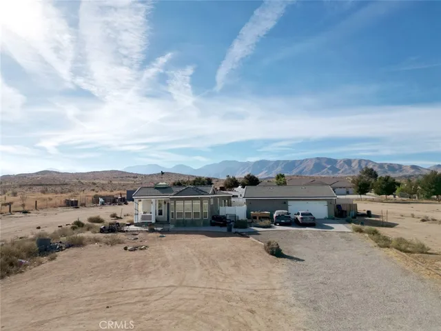 a view of a car parked in front of a road