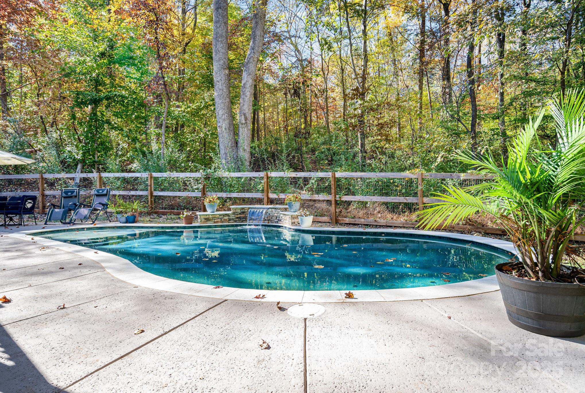 a view of outdoor space yard and swimming pool