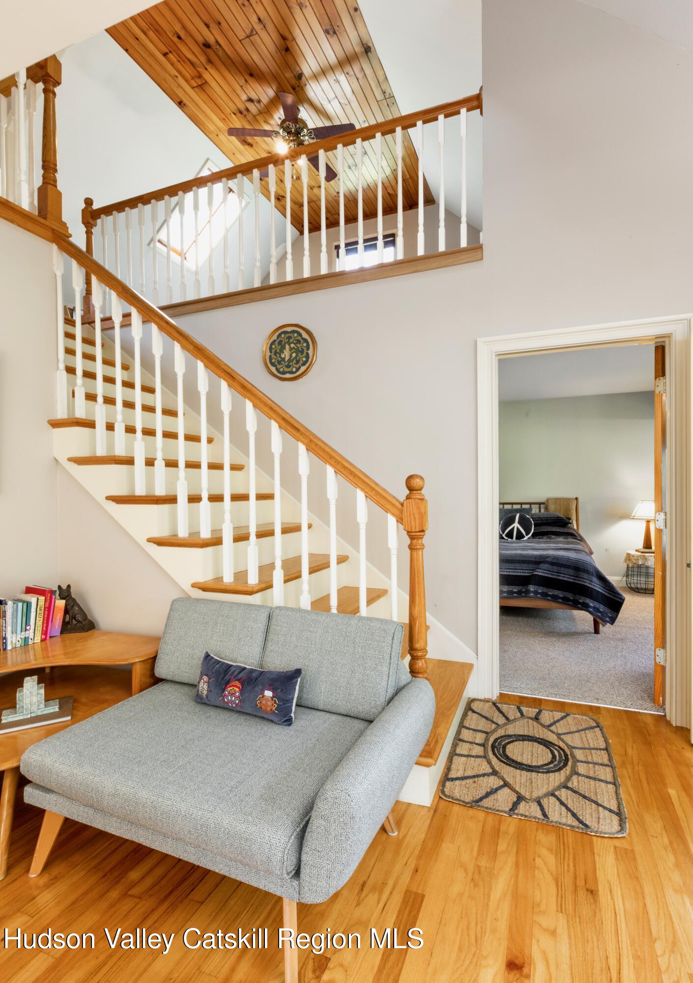 688 Churchland Road Saugerties, NY 12477 - Photo 2 of 37 a bedroom with a bed and a window