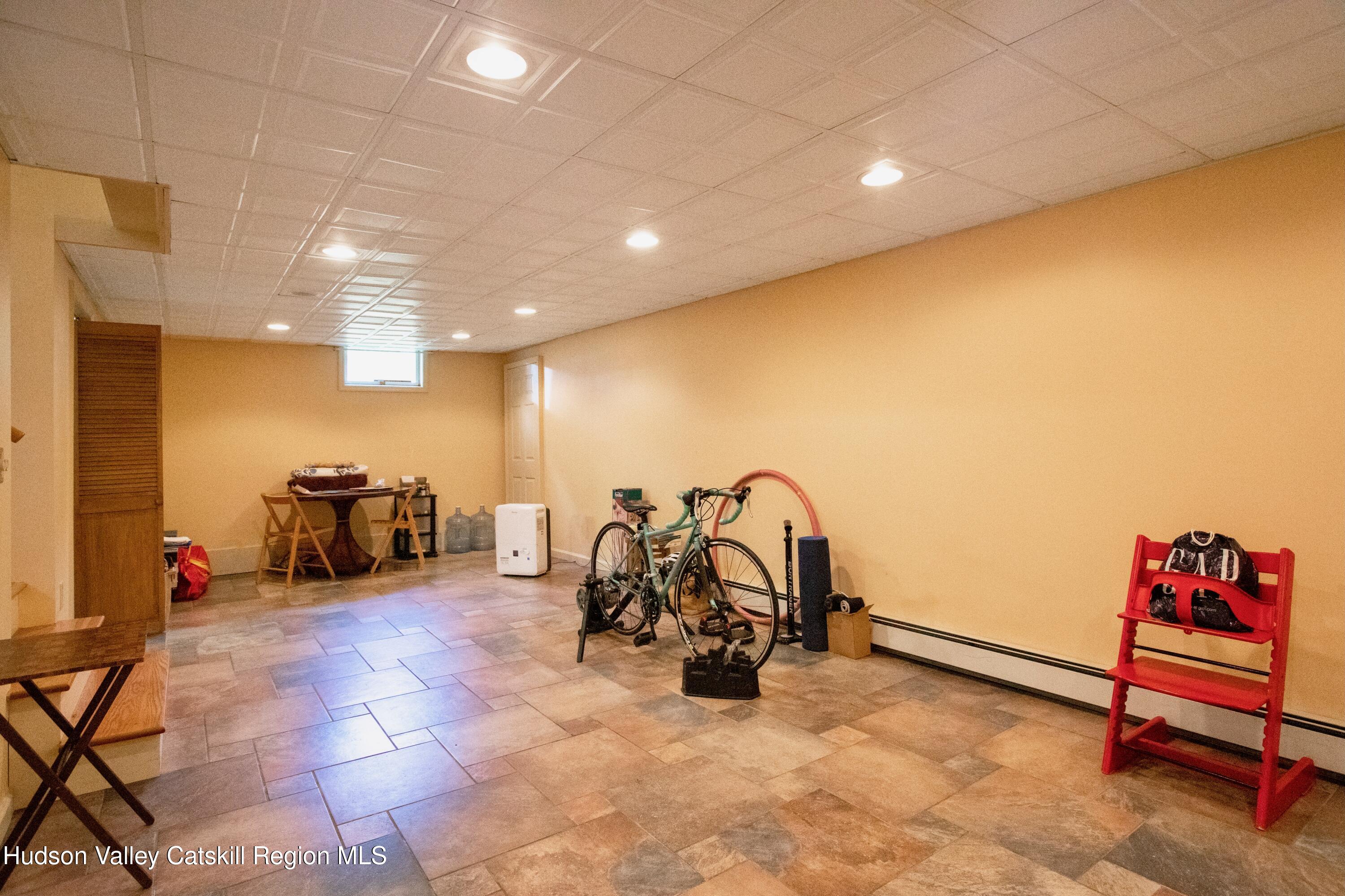 688 Churchland Road Saugerties, NY 12477 - Photo 24 of 37 a view of a room with gym equipment