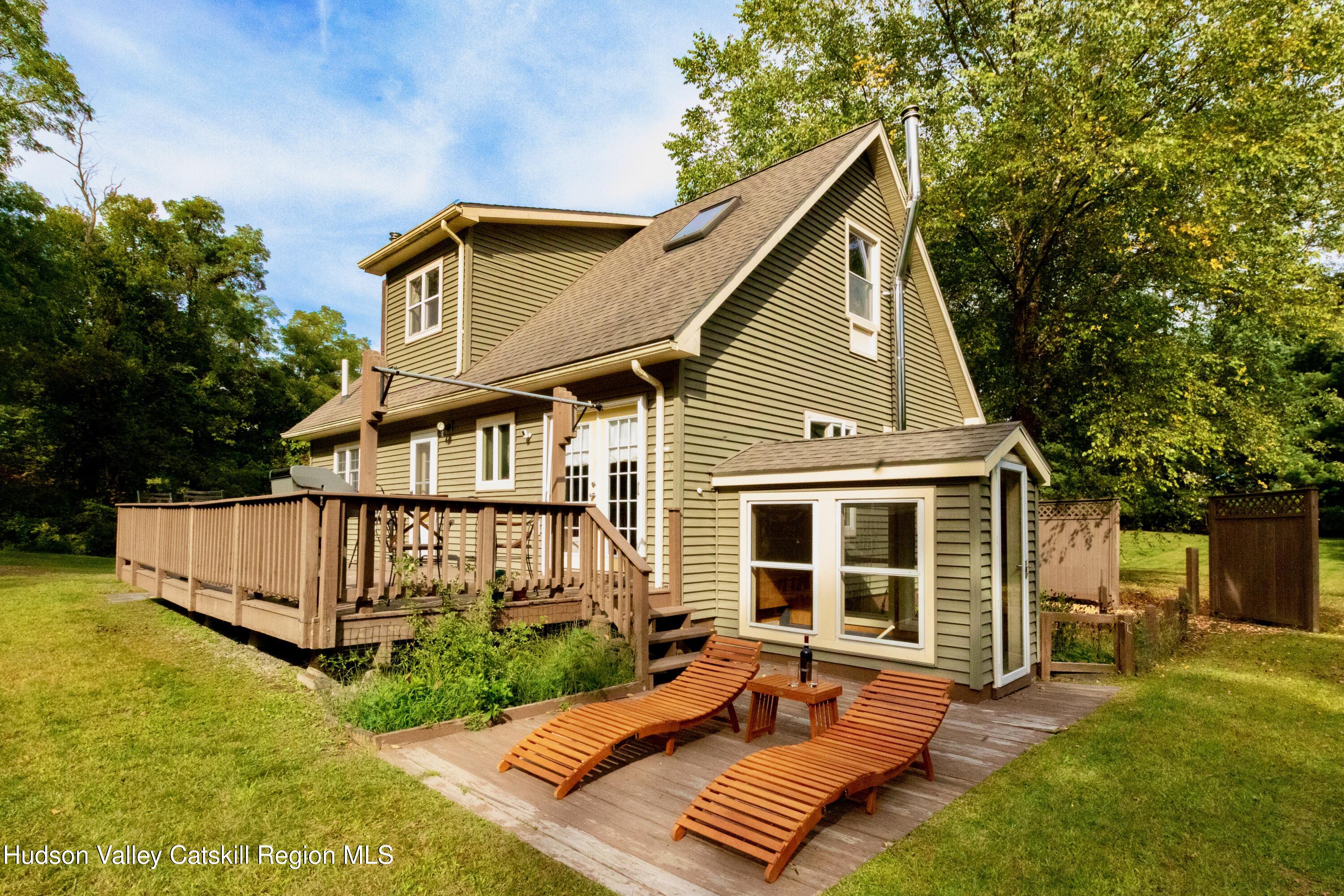 688 Churchland Road Saugerties, NY 12477 - Photo 27 of 37 a view of a house with backyard and porch
