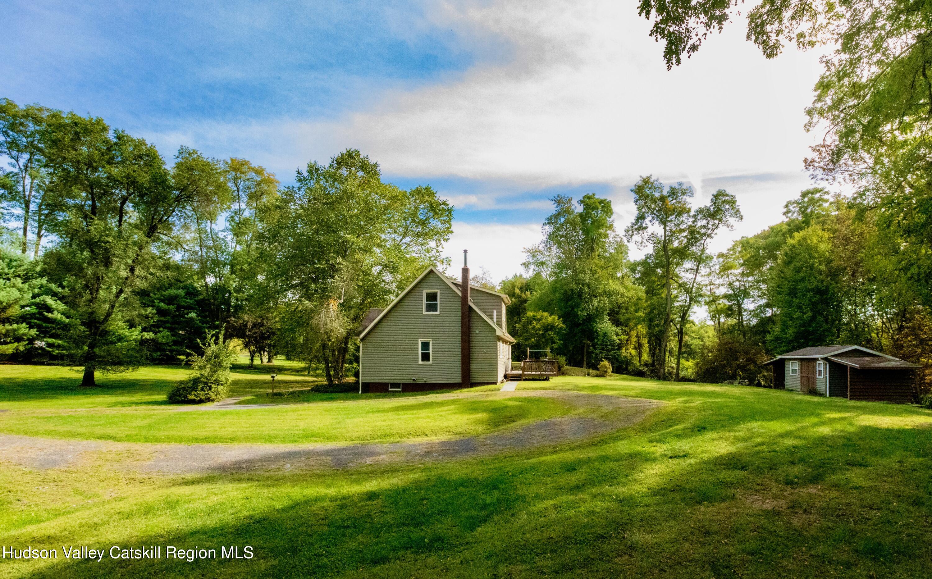688 Churchland Road Saugerties, NY 12477 - Photo 30 of 37 a view of a house with a big yard