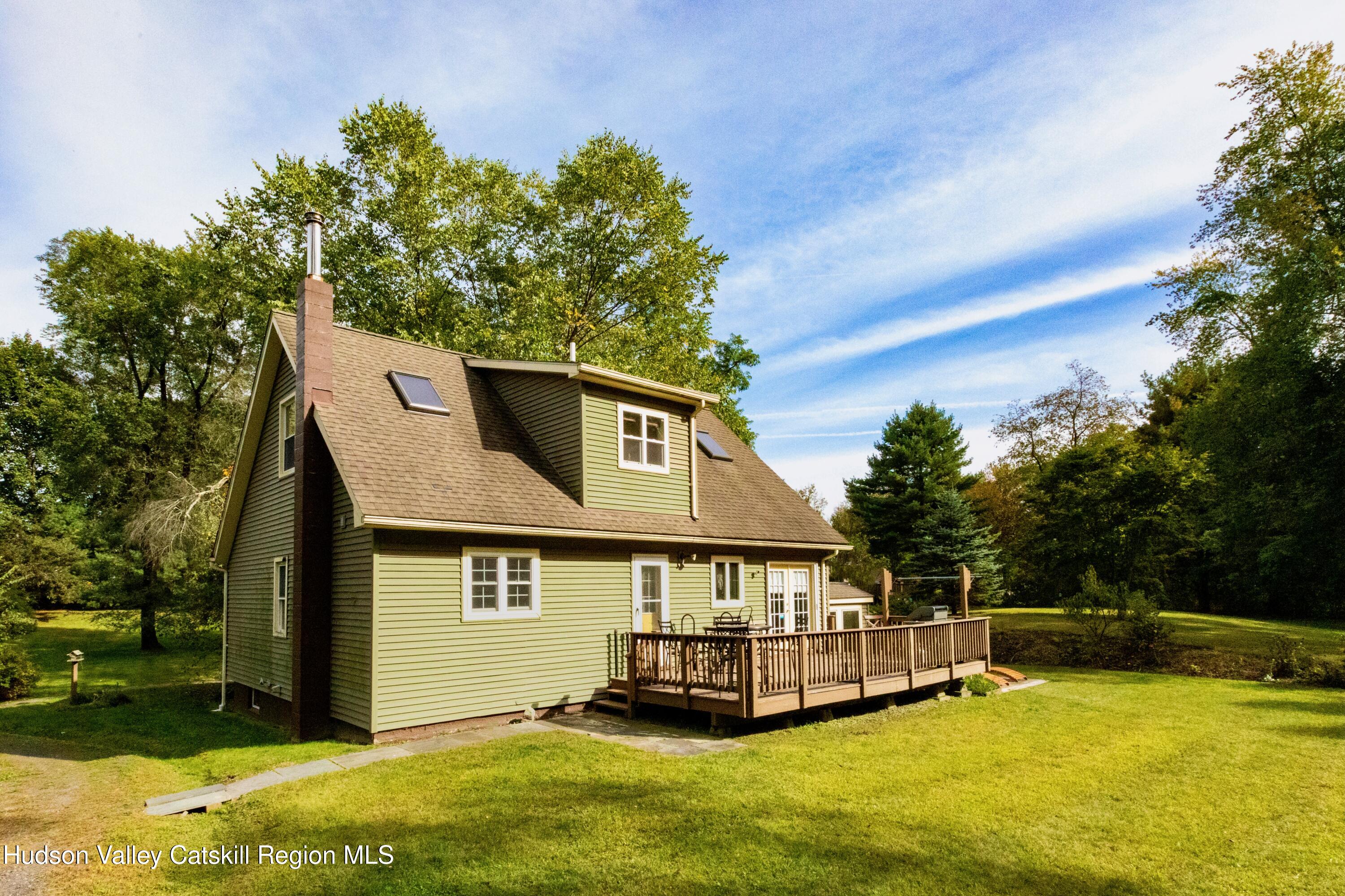 688 Churchland Road Saugerties, NY 12477 - Photo 35 of 37 a front view of a house with a yard