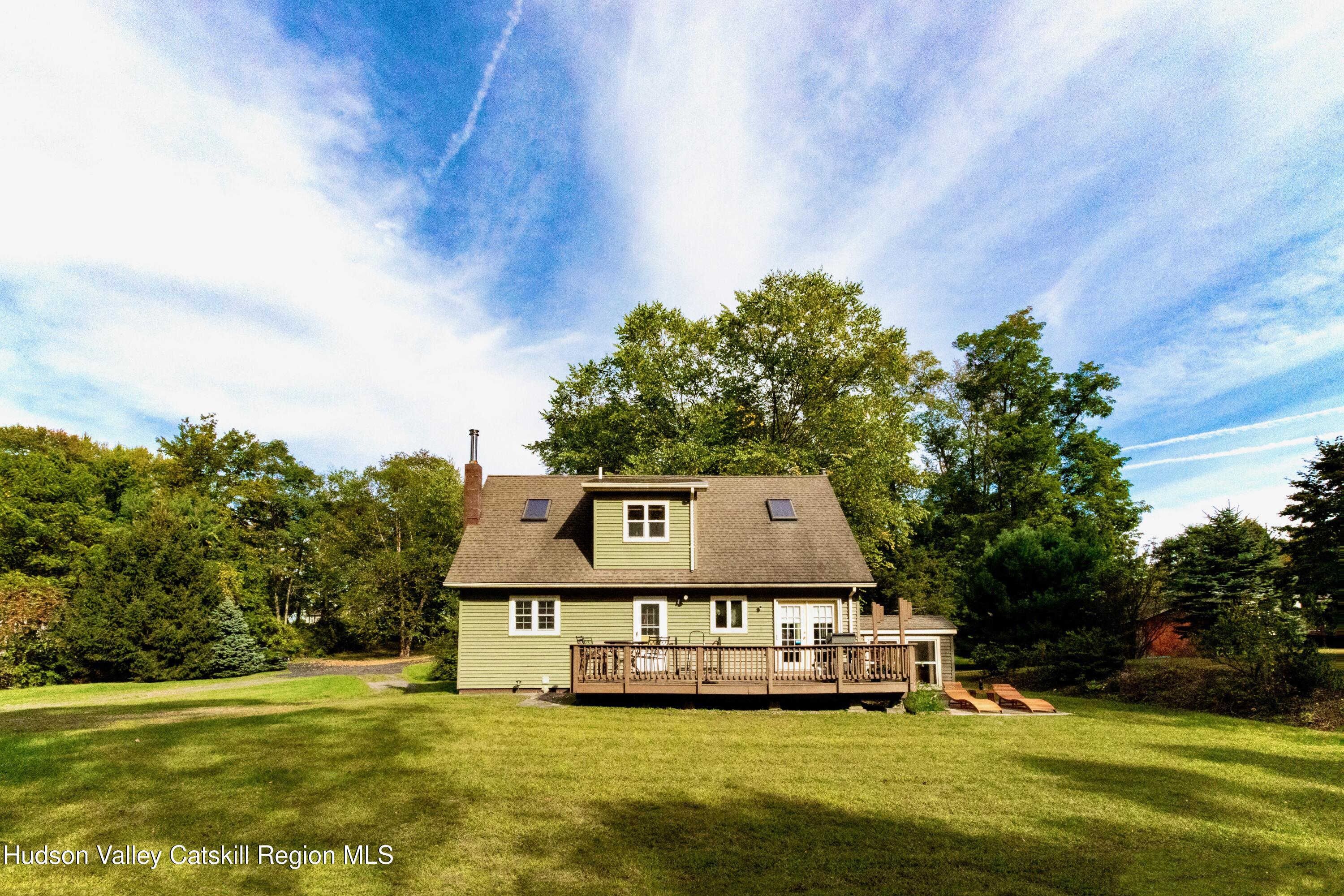 688 Churchland Road Saugerties, NY 12477 - Photo 36 of 37 a house with a yard in front of it