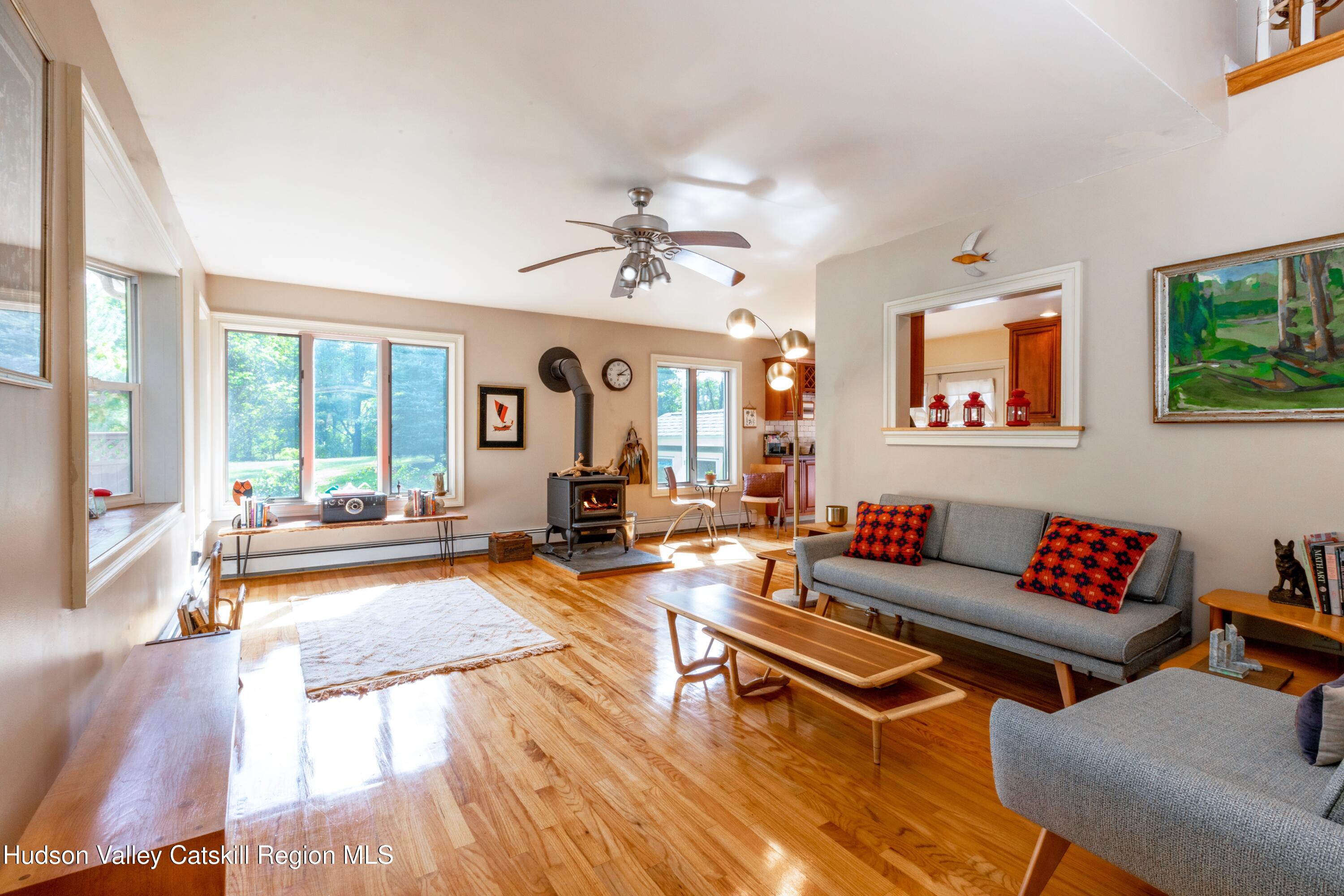 688 Churchland Road Saugerties, NY 12477 - Photo 4 of 37 a living room with furniture and a large window