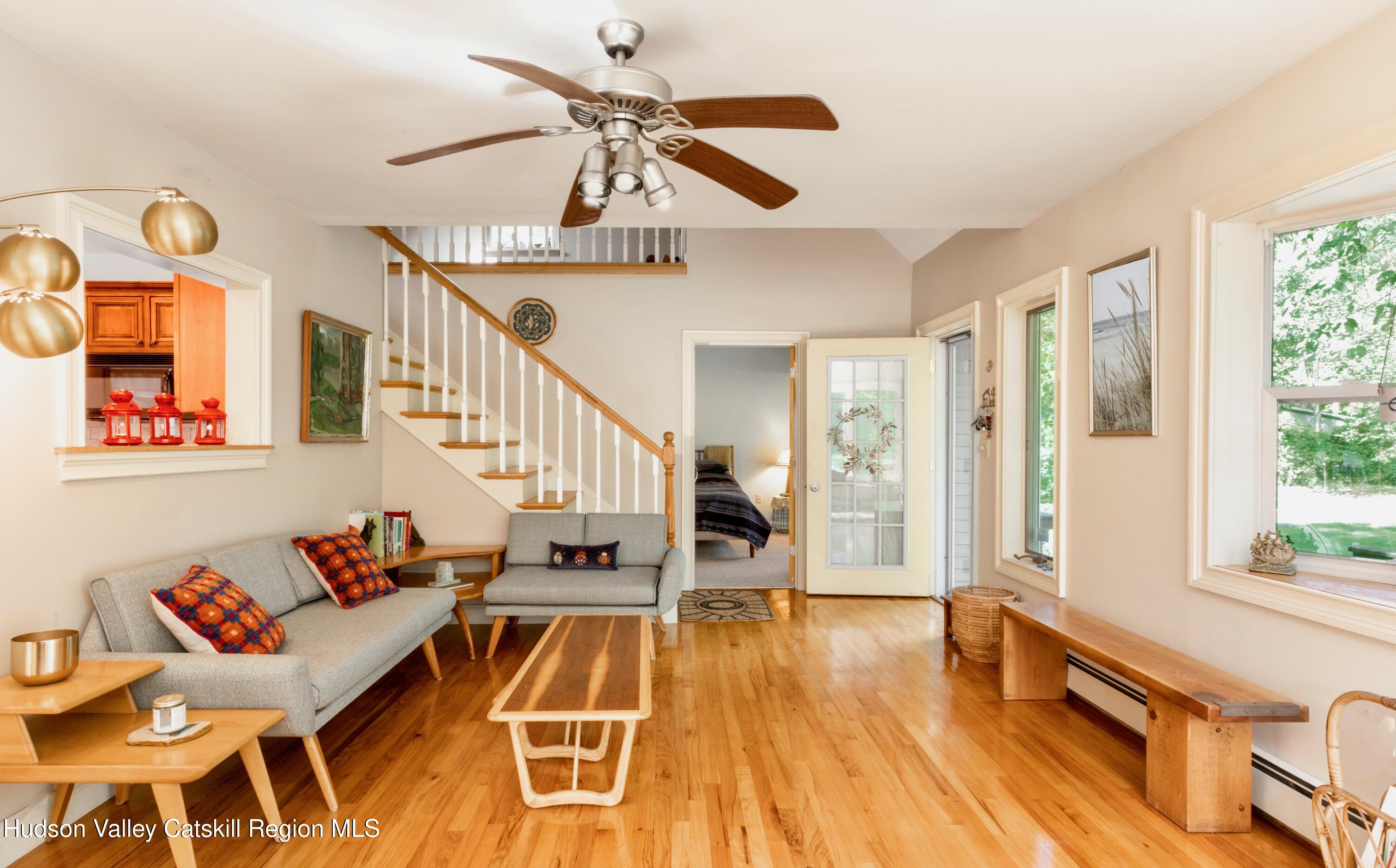 688 Churchland Road Saugerties, NY 12477 - Photo 5 of 37 a living room with furniture and a large window
