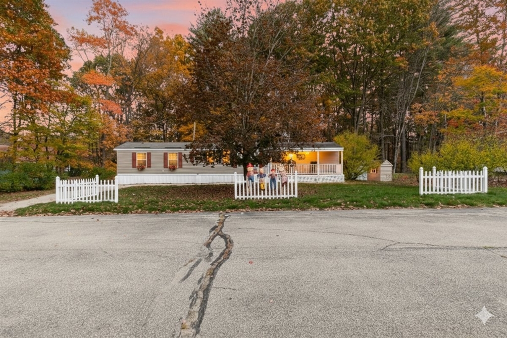 front view of a house with a street
