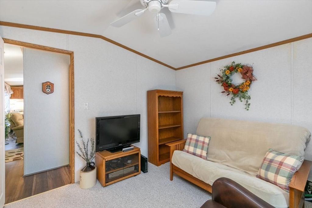 38 Rosemary Street Salem, NH 03079 - Photo 30 of 36 a living room with furniture and a flat screen tv