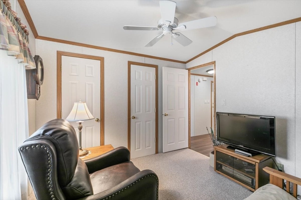 38 Rosemary Street Salem, NH 03079 - Photo 31 of 36 a living room with furniture and a flat screen tv