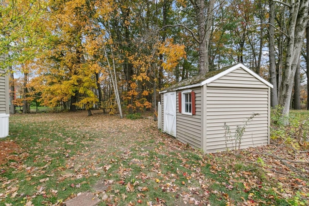 38 Rosemary Street Salem, NH 03079 - Photo 33 of 36 a front view of a house with a yard