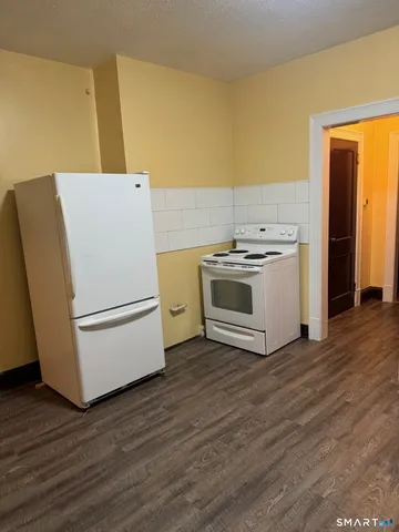 a utility room with washer and dryer