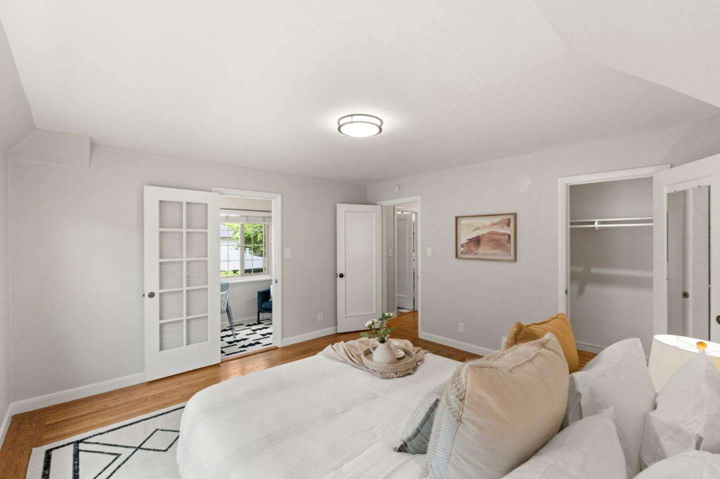 796 Willborough Road Burlingame, CA 94010 - Photo 18 of 31 a bedroom with a bed and a window