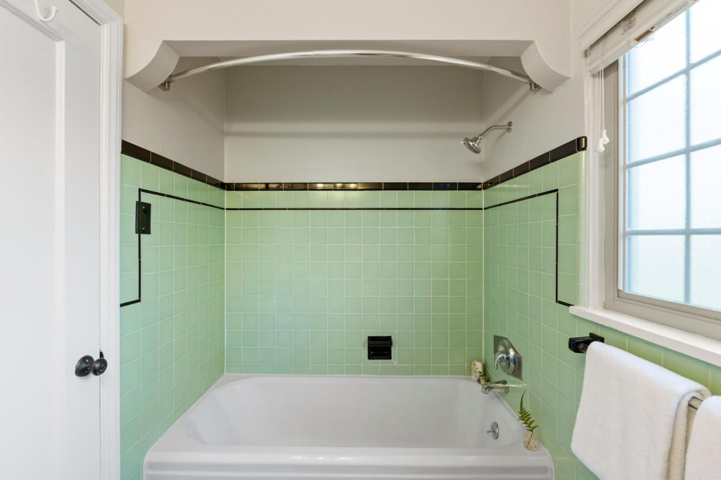 796 Willborough Road Burlingame, CA 94010 - Photo 23 of 31 a bathroom with a shower and a bathtub