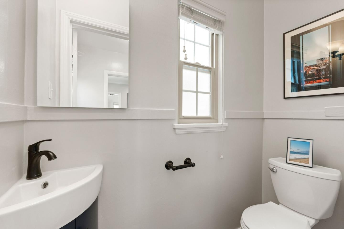 796 Willborough Road Burlingame, CA 94010 - Photo 26 of 31 a bathroom with a toilet a sink and mirror