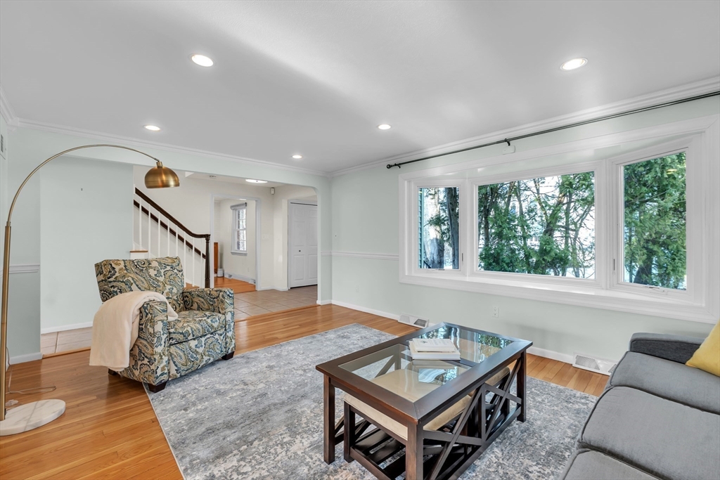 36 Cider Mill Road Framingham, MA 01701 - Photo 11 of 42 a living room with furniture and a large window