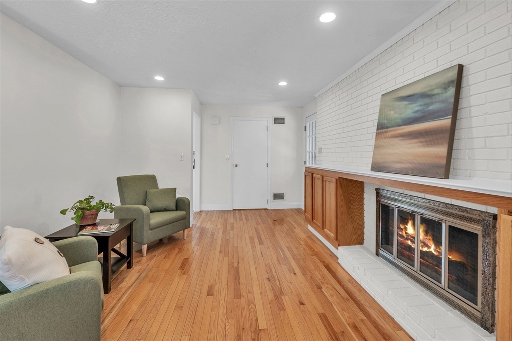 36 Cider Mill Road Framingham, MA 01701 - Photo 18 of 42 a living room with furniture and a fireplace