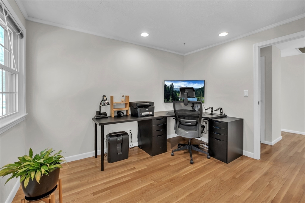 36 Cider Mill Road Framingham, MA 01701 - Photo 25 of 42 a view of a workspace with furniture and a window
