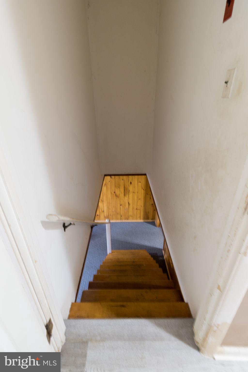 11207 Tippett Road Clinton, MD 20735 - Photo 35 of 76 STAIRWELL TO BASEMENT STEPS