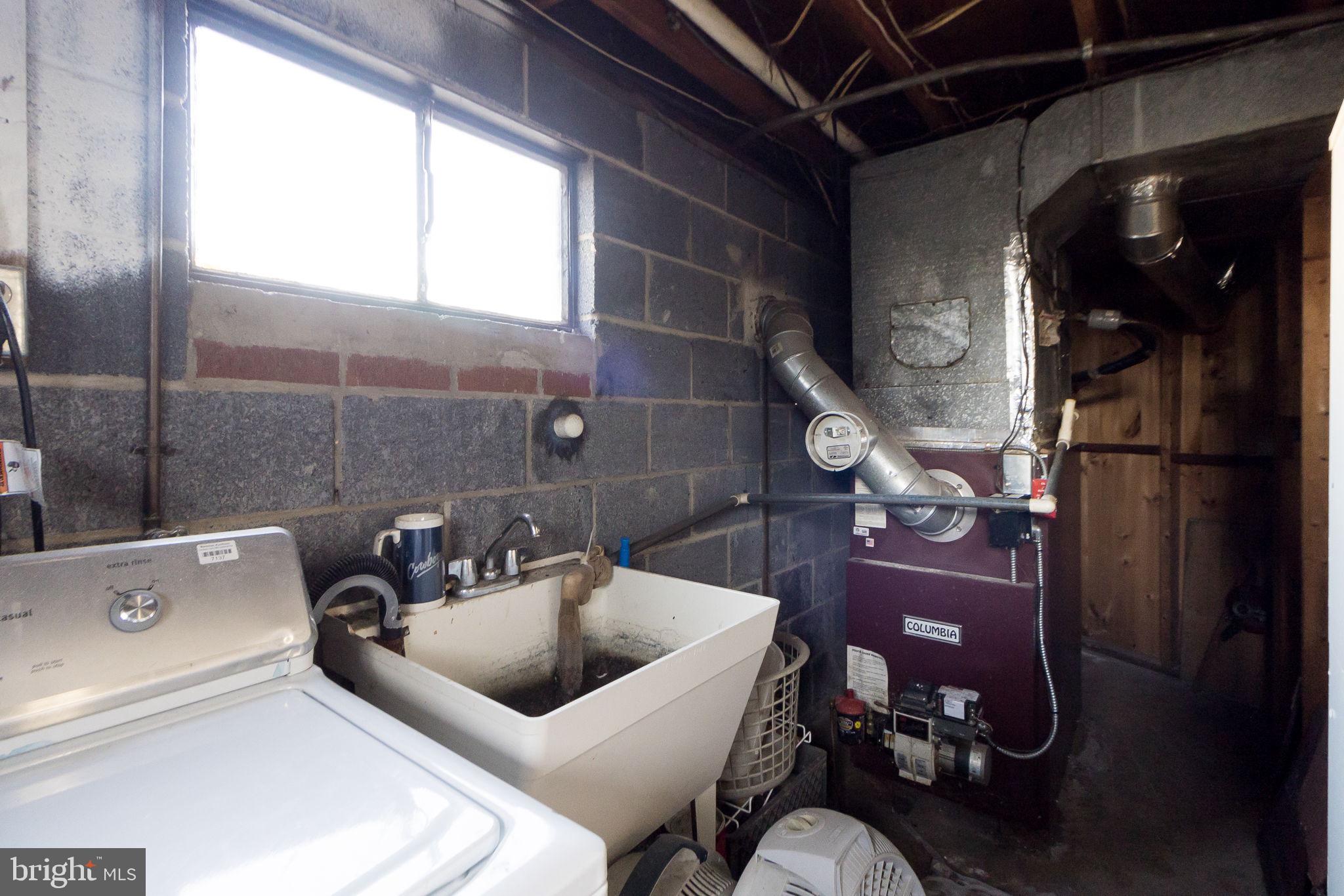 11207 Tippett Road Clinton, MD 20735 - Photo 55 of 76 BASEMENT-LAUNDRY AREA