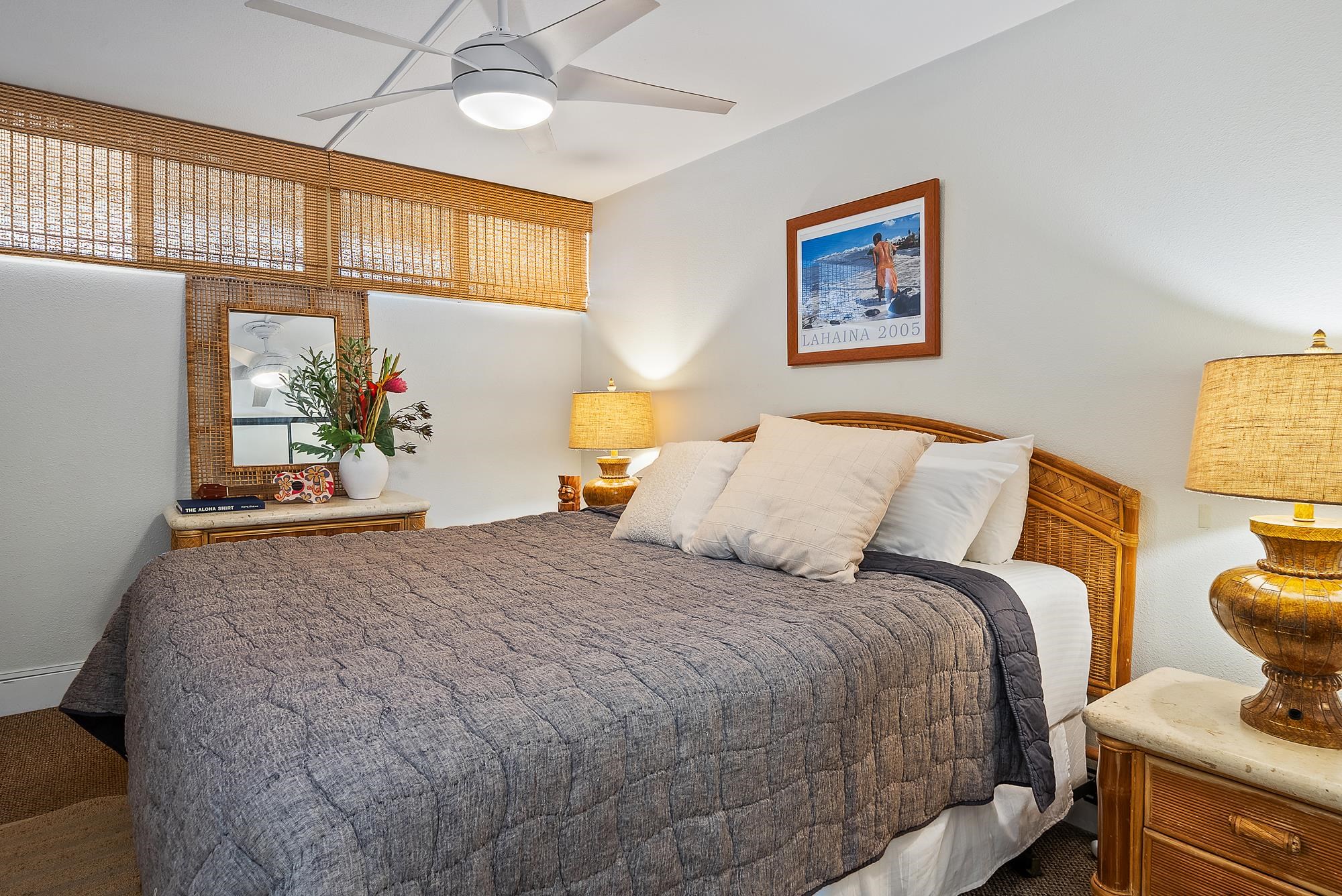 4471 Lower Honoapiilani Road, Unit 118 Lahaina, HI 96761 - Photo 15 of 41 a bedroom with a bed and a window