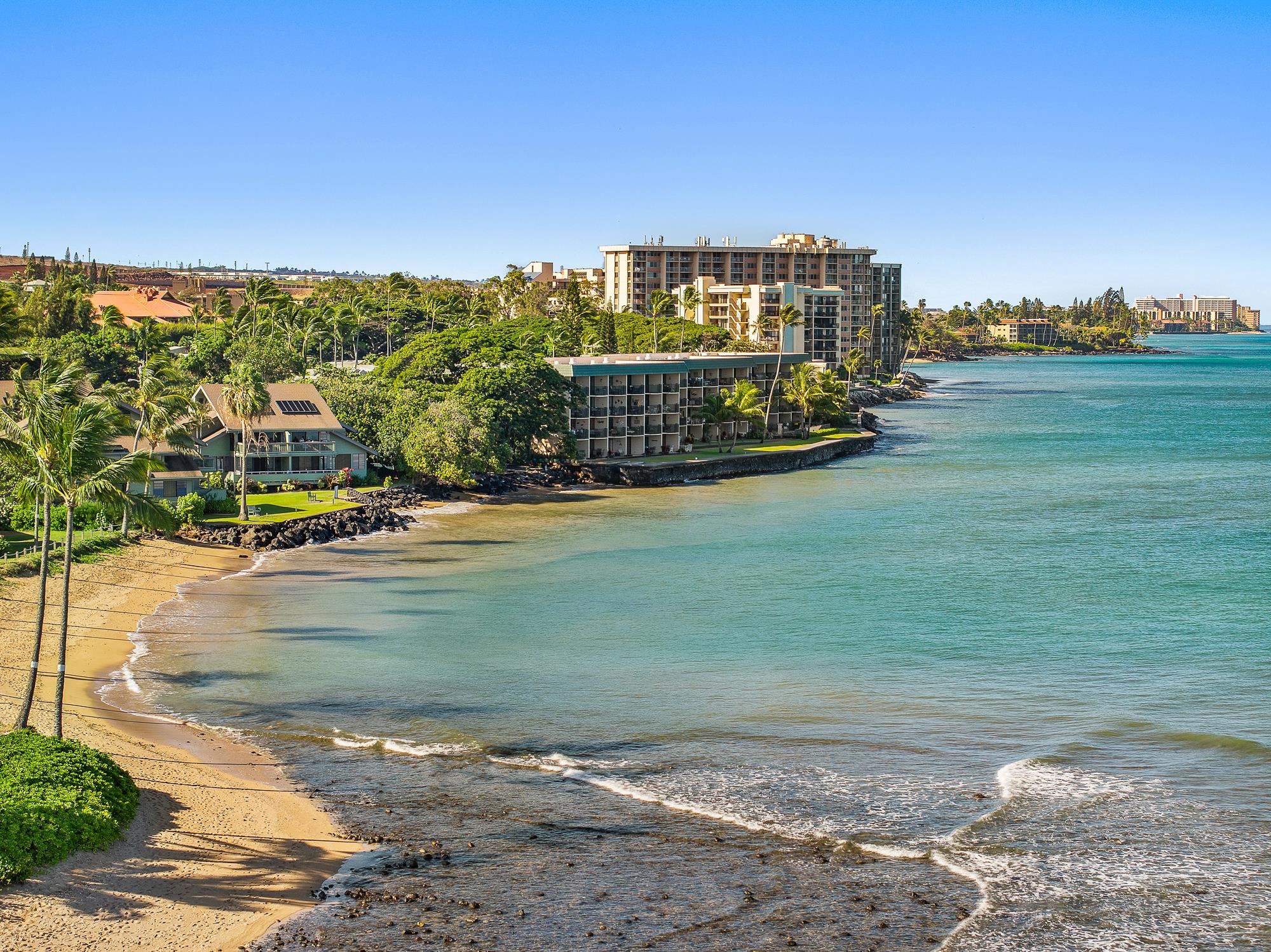 4471 Lower Honoapiilani Road, Unit 118 Lahaina, HI 96761 - Photo 7 of 41 a view of a big yard next to a building