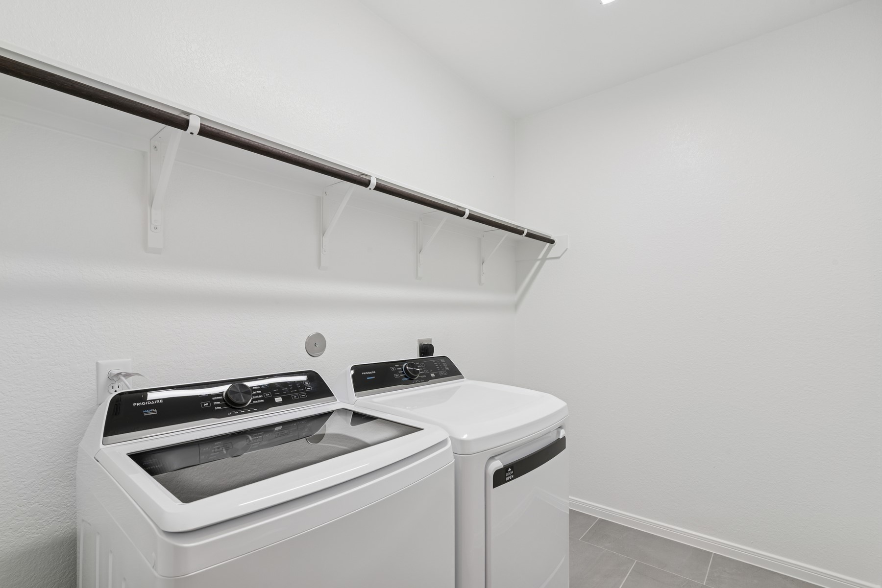 123 Blue River Trail Rosenberg, TX 77471 - Photo 21 of 46 a utility room with dryer and washer