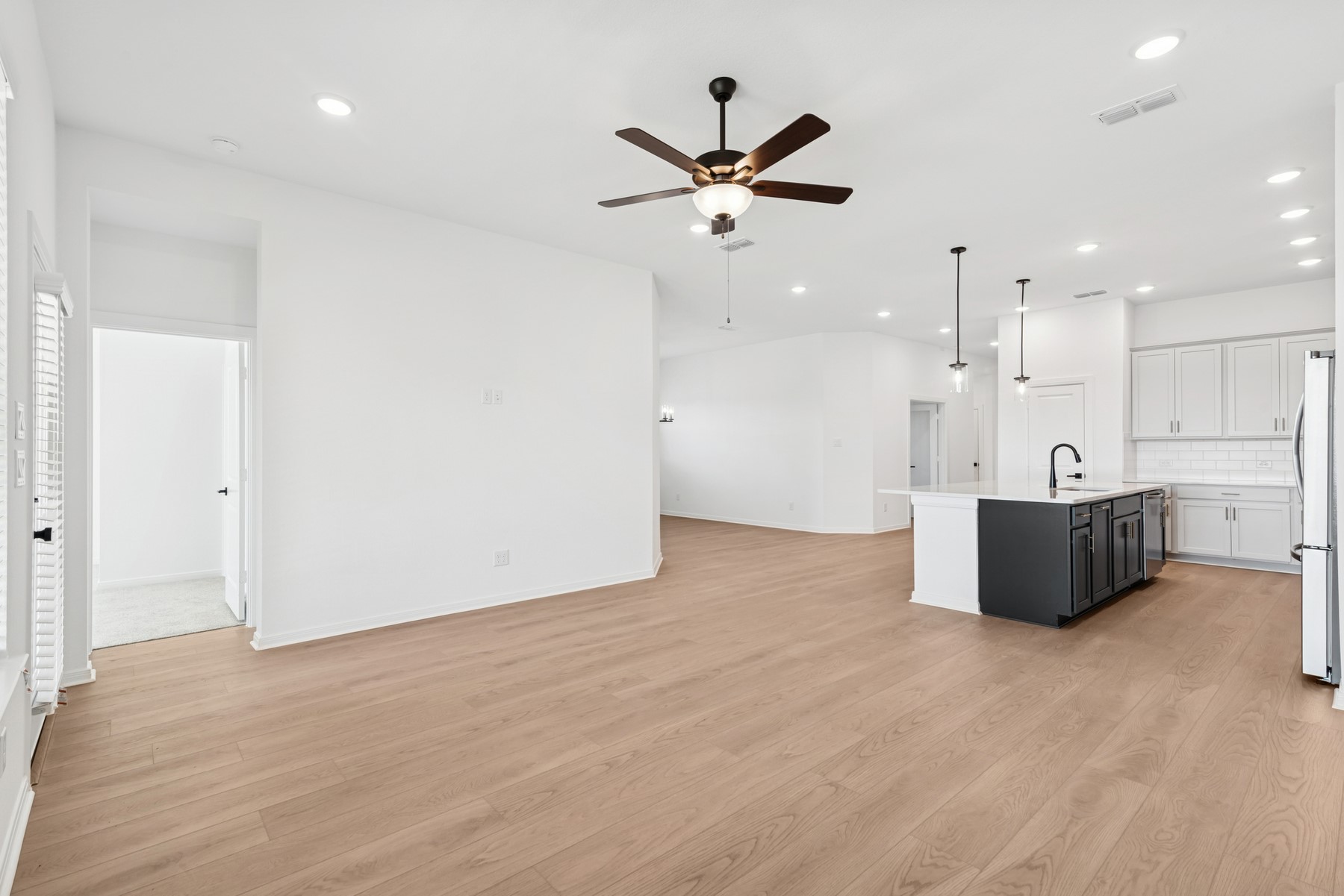 123 Blue River Trail Rosenberg, TX 77471 - Photo 36 of 46 a view of a kitchen with a refrigerator and window