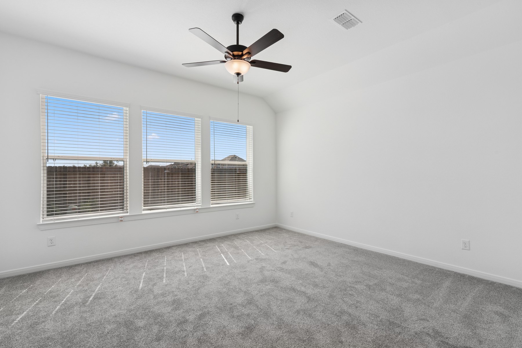 123 Blue River Trail Rosenberg, TX 77471 - Photo 37 of 46 a view of an empty room with a window