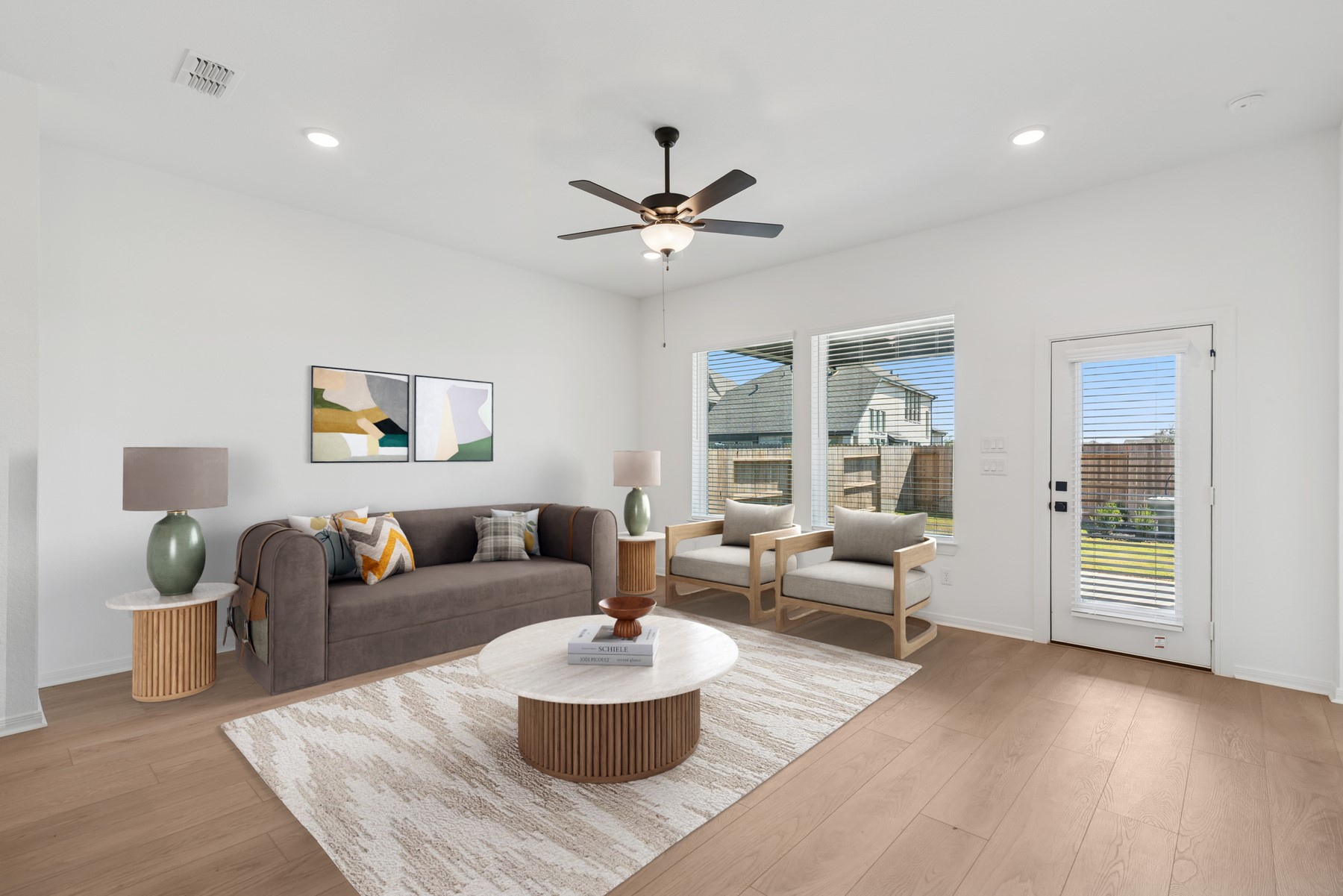123 Blue River Trail Rosenberg, TX 77471 - Photo 5 of 46 a living room with furniture and a large window