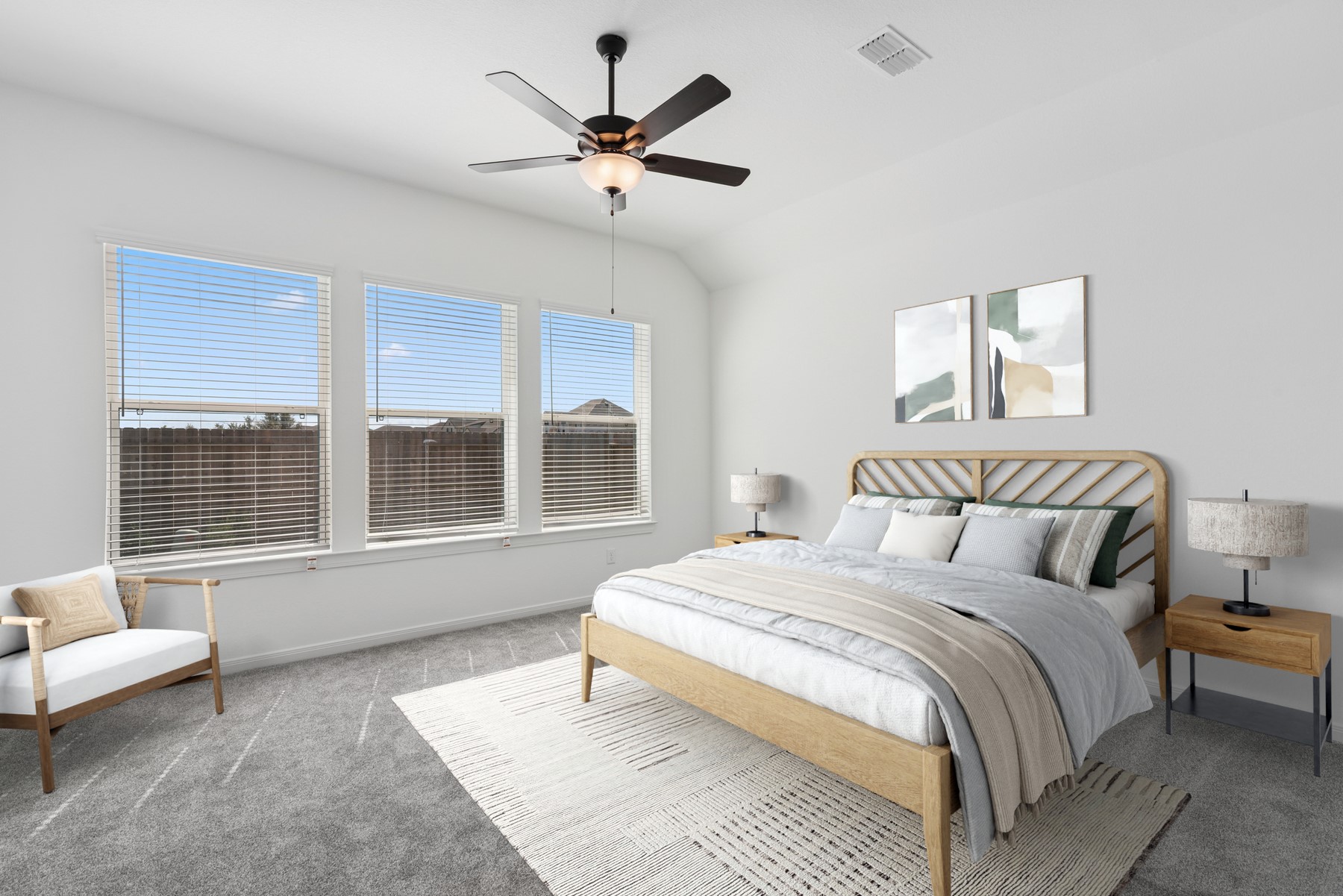 123 Blue River Trail Rosenberg, TX 77471 - Photo 6 of 46 a spacious bedroom with a large bed and a large window