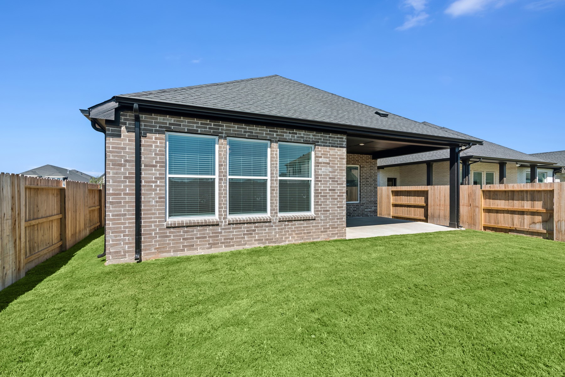 123 Blue River Trail Rosenberg, TX 77471 - Photo 9 of 46 a front view of a house with a garden