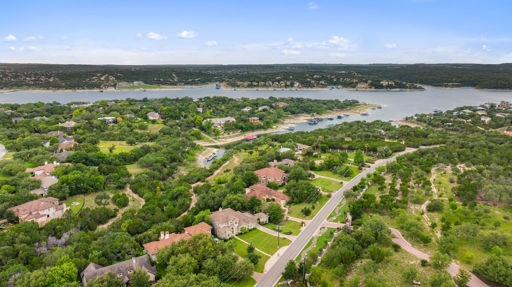 701 Hurst Creek Road Lakeway, TX 78734 - Photo 30 of 37 Aerial view of the neighborhood and community day dock behind the properties.