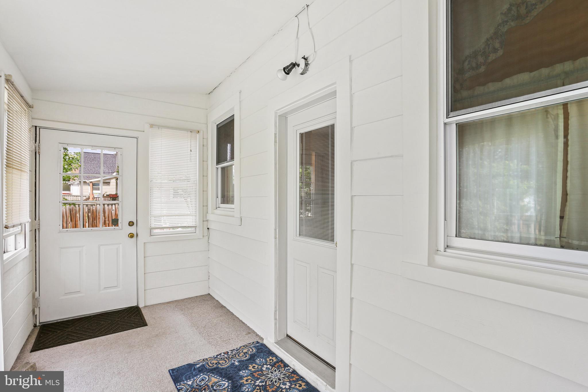 1218 Leeds Terrace Halethorpe, MD 21227 - Photo 14 of 31 Easy access to yard from sunroom