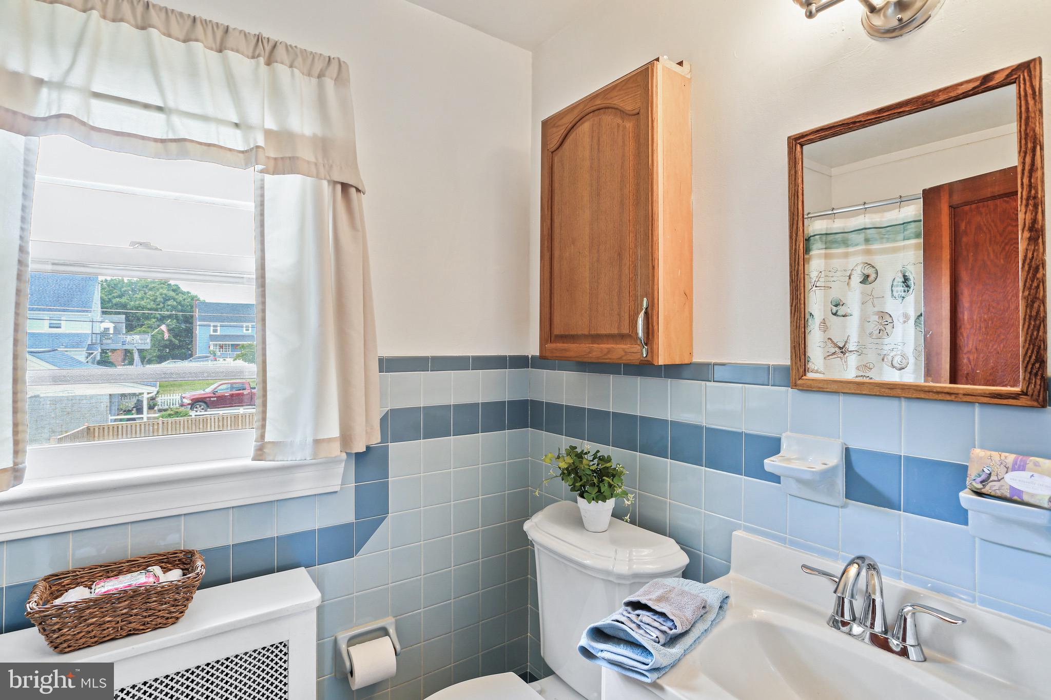 1218 Leeds Terrace Halethorpe, MD 21227 - Photo 20 of 31 2nd floor hall bath with new tub enclosure