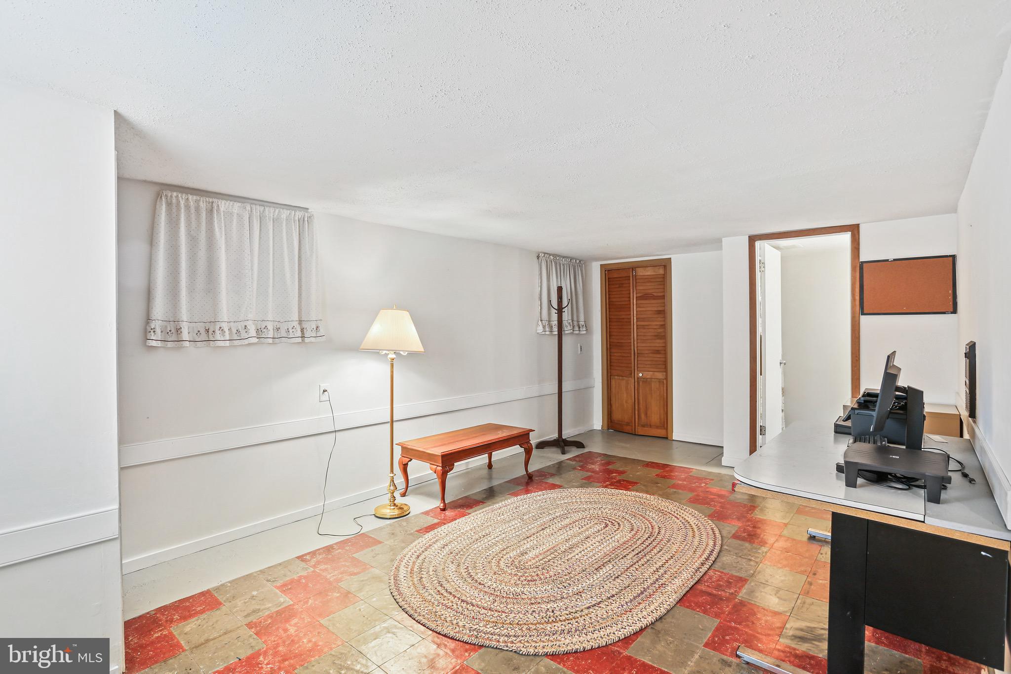 1218 Leeds Terrace Halethorpe, MD 21227 - Photo 25 of 31 Partially finished basement with newer full bath
