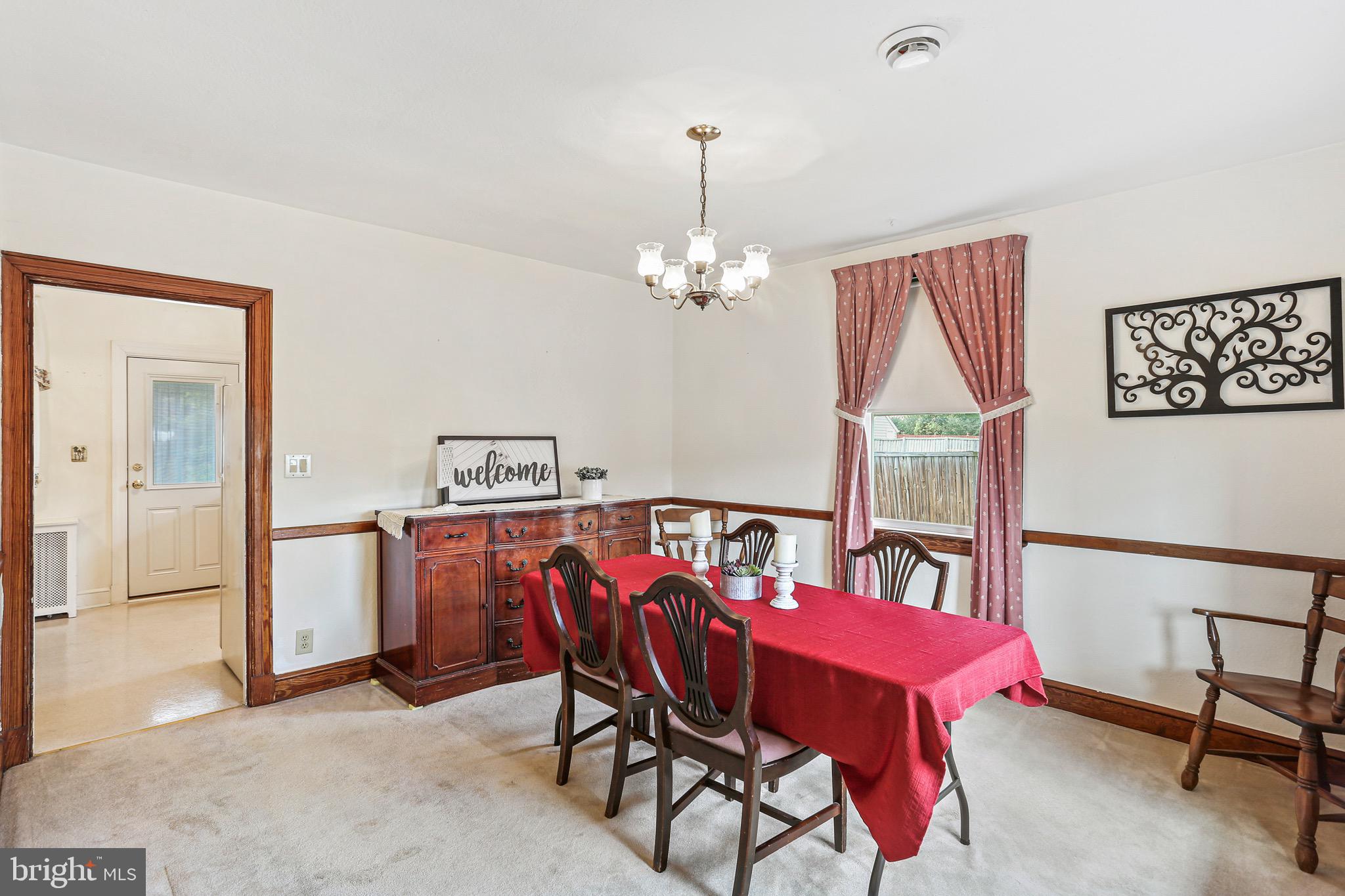 1218 Leeds Terrace Halethorpe, MD 21227 - Photo 8 of 31 Family size dining room with chair rail