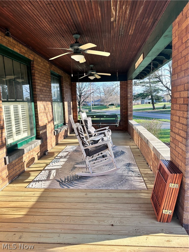 902 Cambridge Road Coshocton, OH 43812 - Photo 1 of 8 Covered front porch with ceiling fan