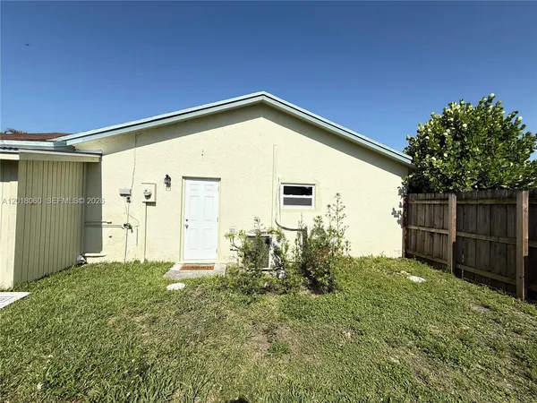 a view of backyard of house