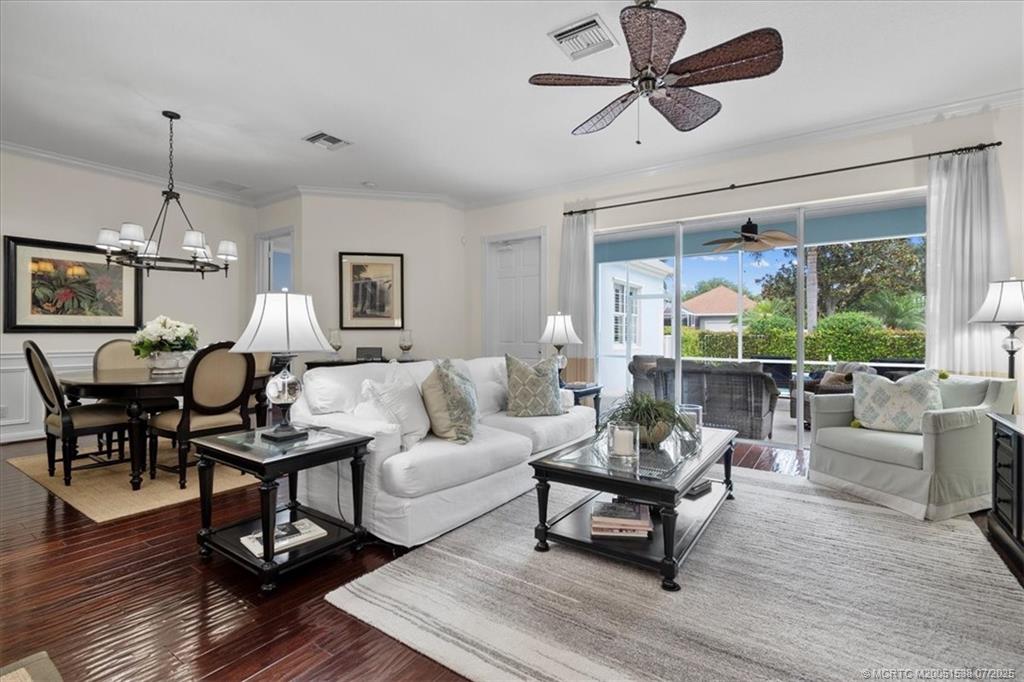 107 Castries Drive Jupiter, FL 33458 - Photo 11 of 39 a living room with furniture and a large window