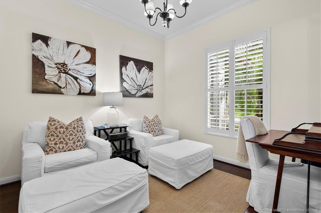 107 Castries Drive Jupiter, FL 33458 - Photo 26 of 39 a living room with furniture and a large window