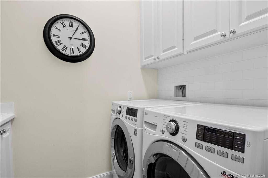 107 Castries Drive Jupiter, FL 33458 - Photo 27 of 39 a view of washer and dryer
