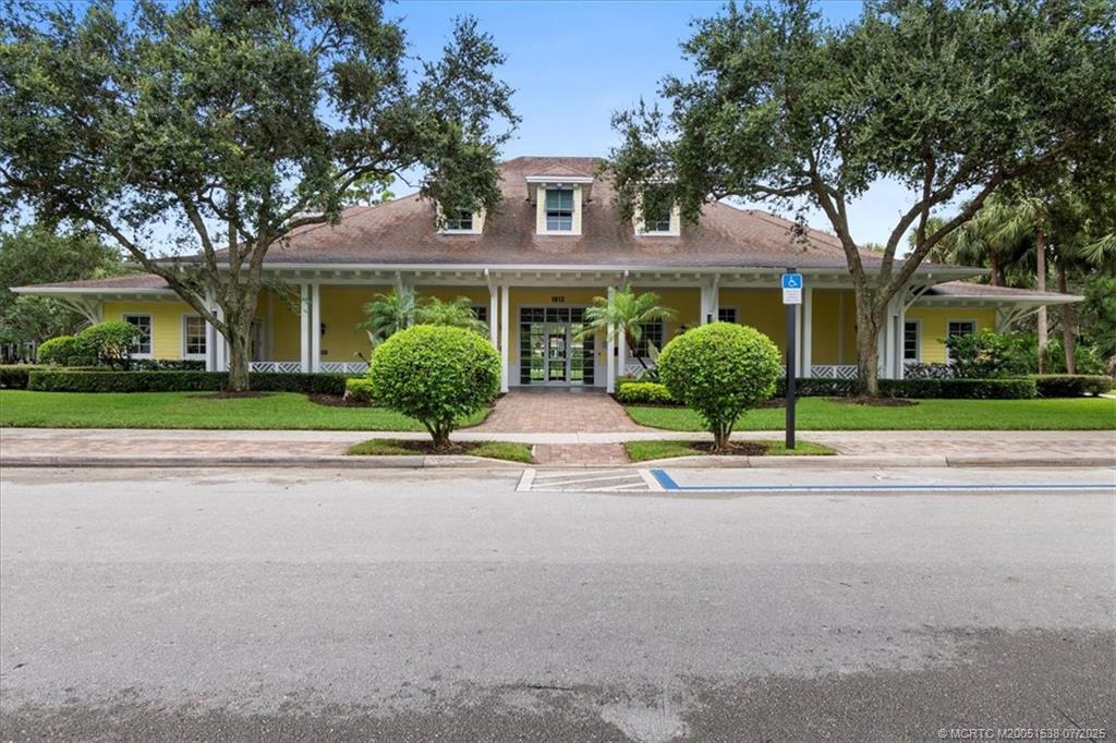 107 Castries Drive Jupiter, FL 33458 - Photo 39 of 39 front view of house with a yard