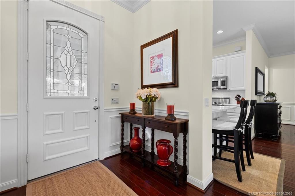 107 Castries Drive Jupiter, FL 33458 - Photo 10 of 39 a room with furniture a rug and a window