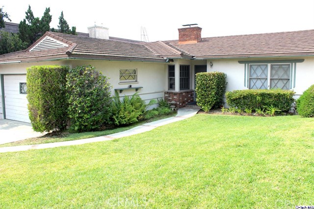 1447 Valley View Road Glendale, CA 91202 - Photo 1 of 1 a front view of a house with garden