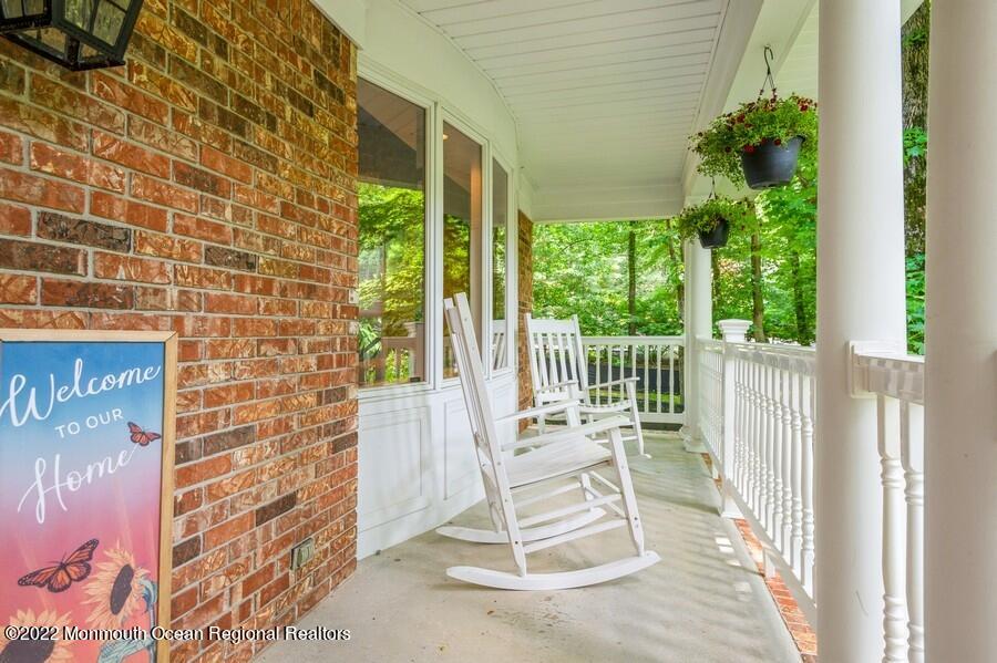 3 Canyon Run Road Holmdel, NJ 07733 - Photo 3 of 36 30_3CanyonRun_65_Porch_LowRes