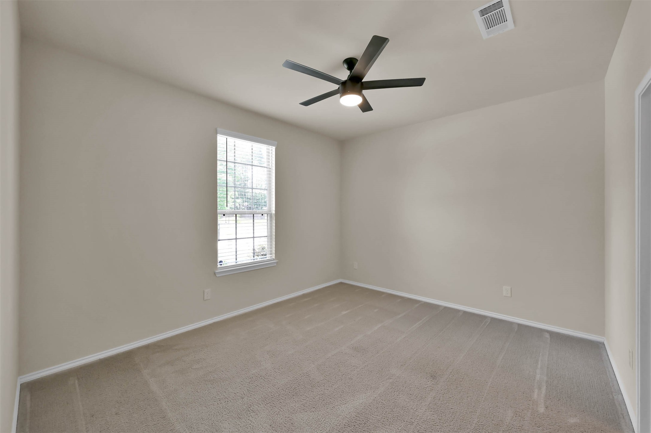 4231 Pine Still Road Conroe, TX 77304 - Photo 11 of 27 Bedroom #2 with private bathroom.
