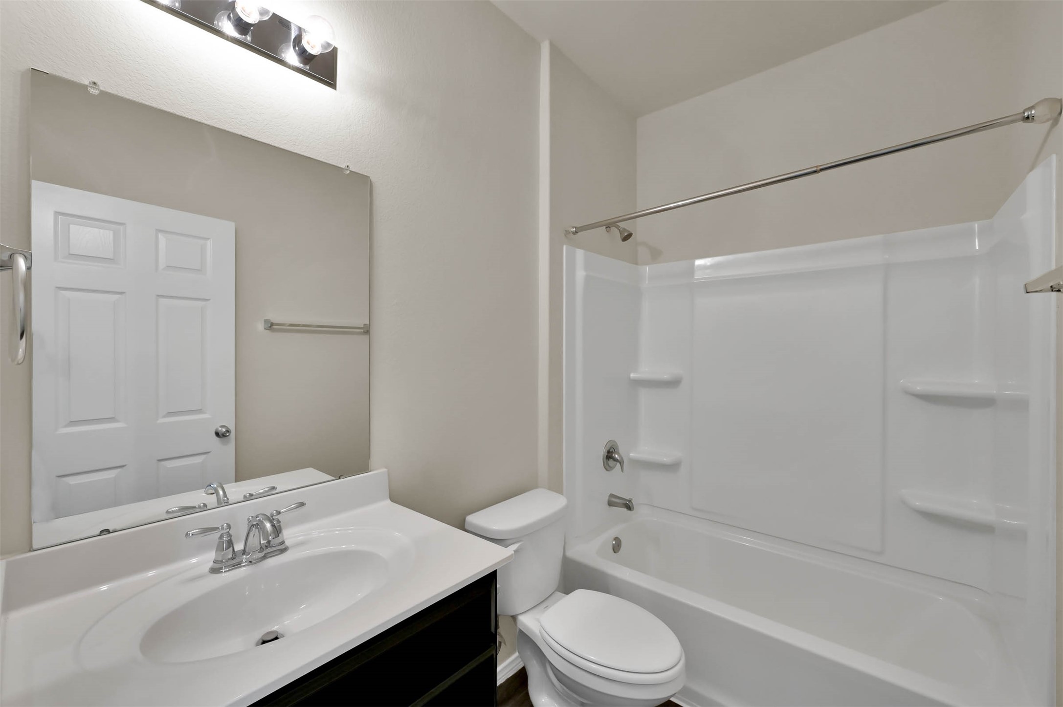 4231 Pine Still Road Conroe, TX 77304 - Photo 16 of 27 Hall bathroom shared between two middle bedrooms