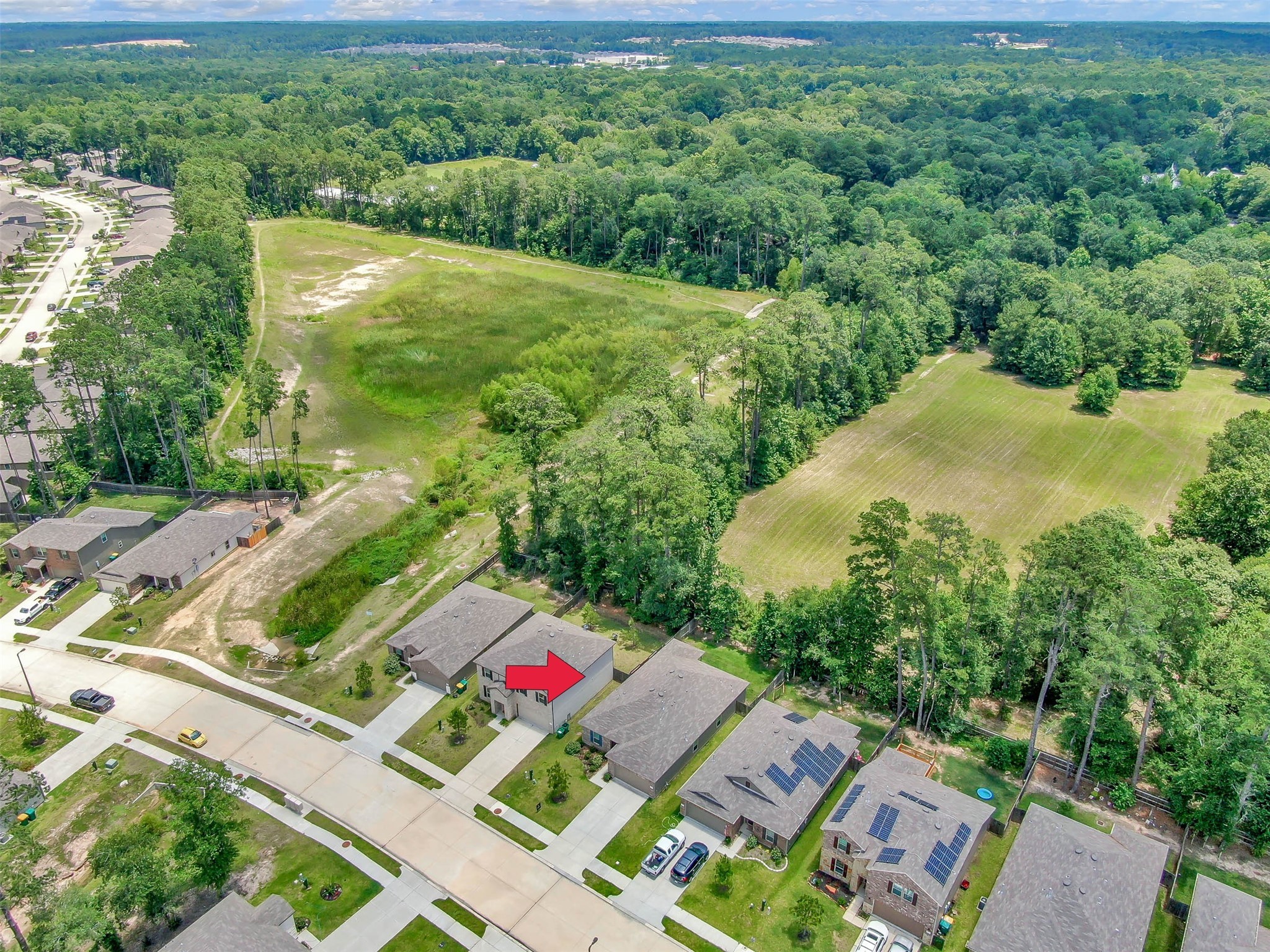 4231 Pine Still Road Conroe, TX 77304 - Photo 26 of 27 Arrow points our 4231 Pine Still with private acreage behind it!