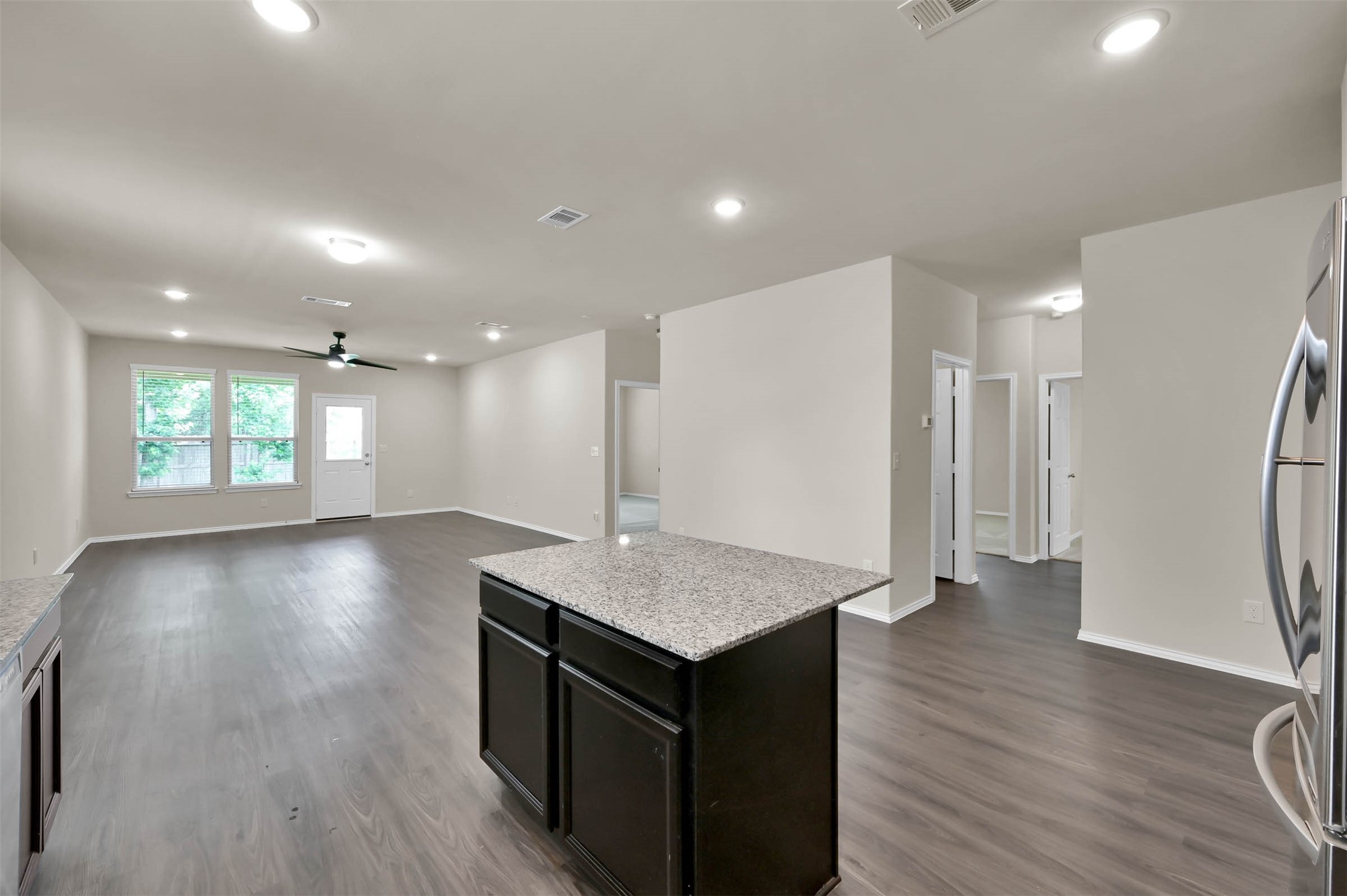 4231 Pine Still Road Conroe, TX 77304 - Photo 4 of 27 Cook diner AND be involved in the family room activities too!