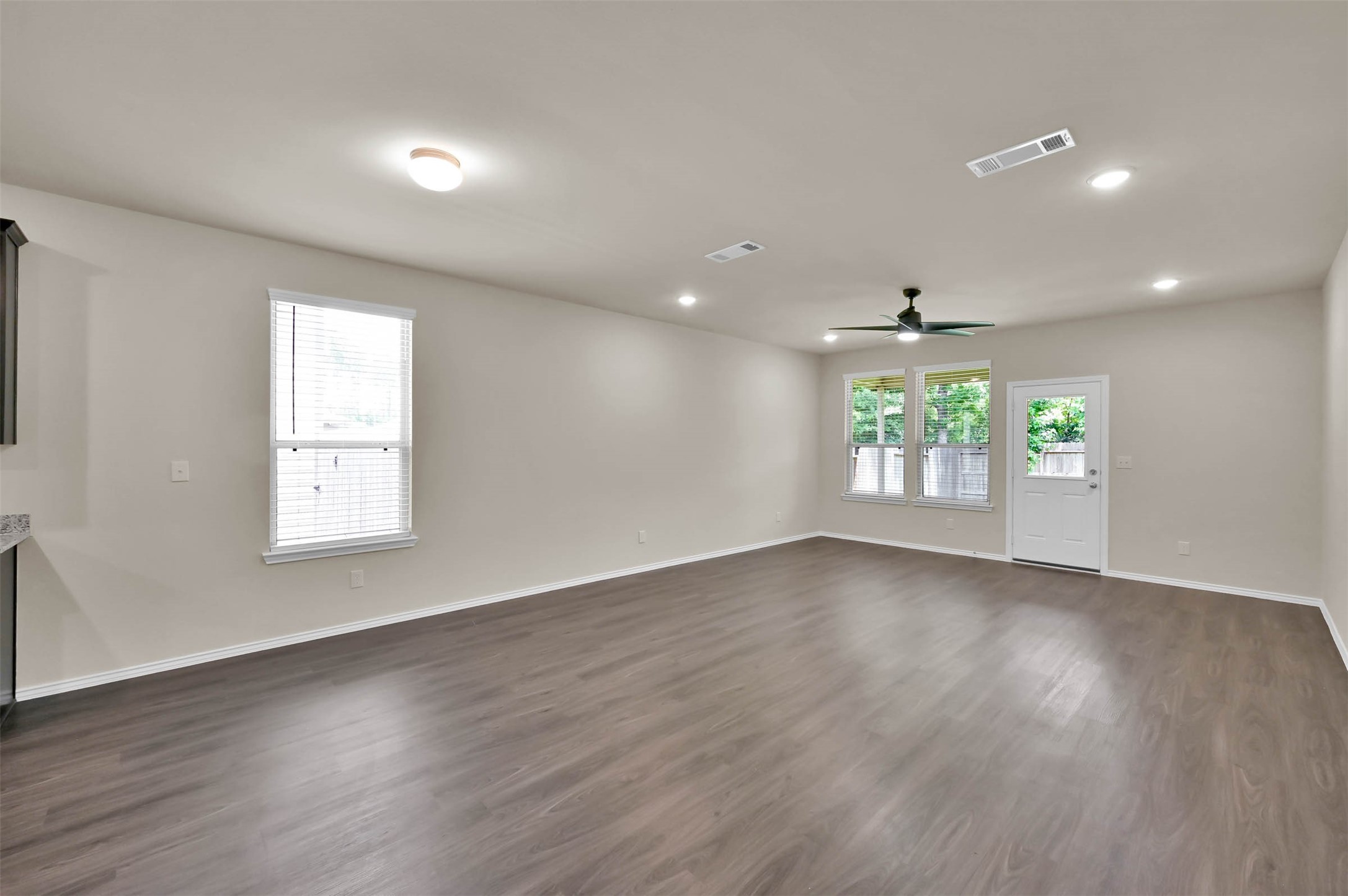 4231 Pine Still Road Conroe, TX 77304 - Photo 5 of 27 Open space for dining table and living room.